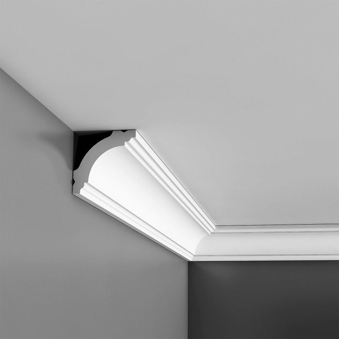 White crown moulding installed at ceiling line